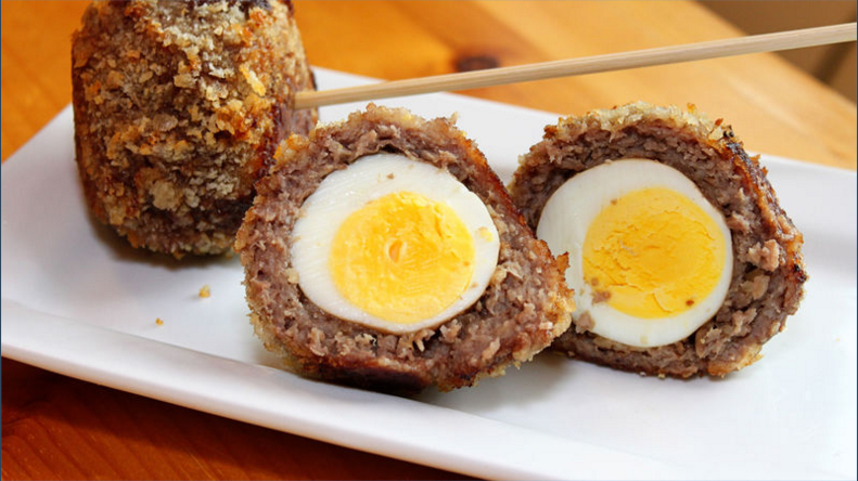 Breaded eggs; boiled eggs coated with beat eggs and flour then deep fried till golden brown