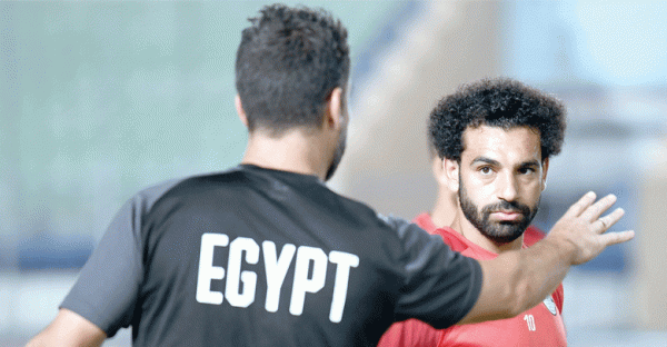 Egypt’s-forward-Mohamed-Salah-R-listens-to-a-coach