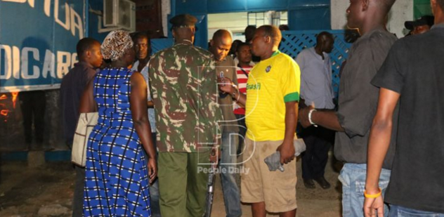 A police officer keep watch at Yeshua Medicare hospital at Bamburi where the victims of the attack were rushed for treatment.