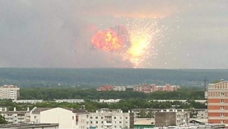 Huge blasts as Russian arms depot in Siberia explodes