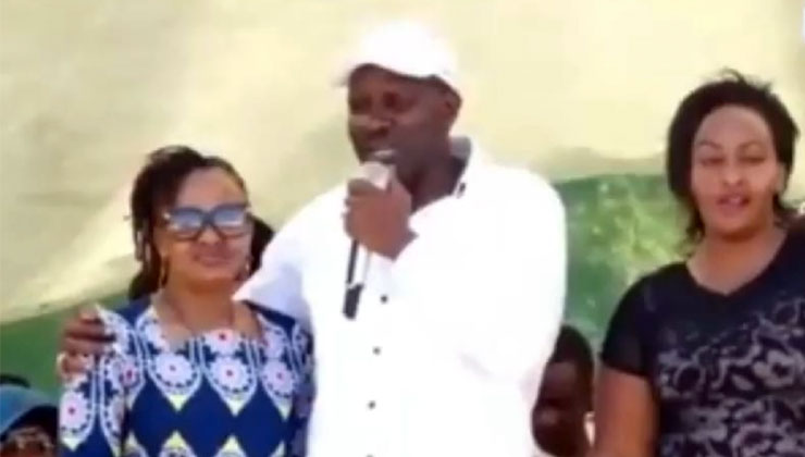 Nakuru Town East MP David Gikaria parades his wives, Veronica Wairimu (L) and Dorcas Wangui (R), at the “Inua Mama” rally held at the Nakuru ASK Showground on Friday, September 13. [PHOTO | COURTESY]