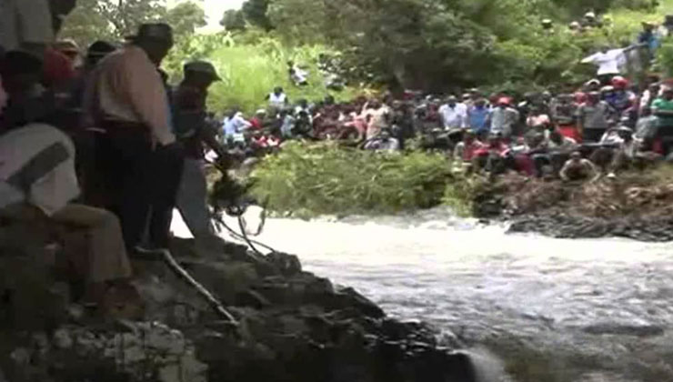 The bodies of two men and a woman were seen by a female resident who had gone to the river to fetch water at 7am. [PHOTO | COURTESY]