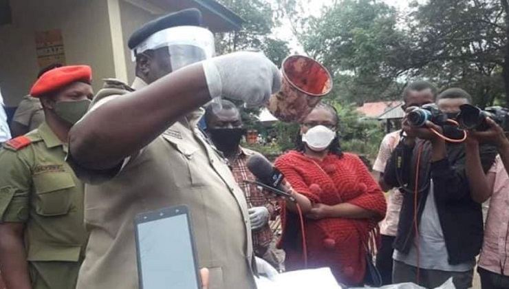 Arusha regional police commander, Jonathan Shanna, displays the metallic cup that Daniel Emmanuel allegedly used in tapping and drinking his mother’s blood. [PHOTO | COURTESY]