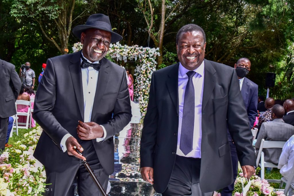 Deputy President William Ruto with ANC boss Musalia Mudavadi at June Ruto's wedding in Karen