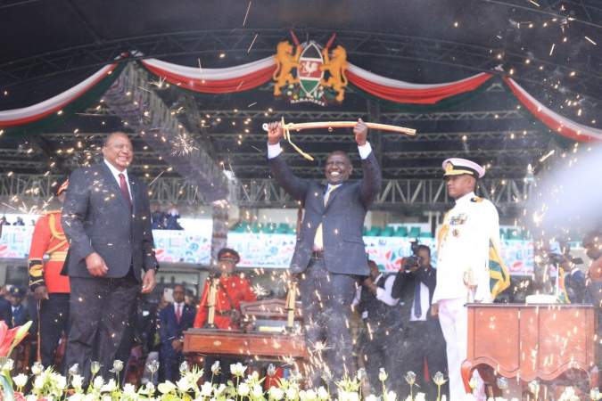 Uhuru hands over instruments of power to Ruto