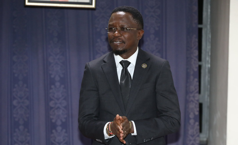 CS Ababu Namwamba paying tribute to Njambi Koikai at All Saints Cathedral. PHOTO/@moyasa_ke/X