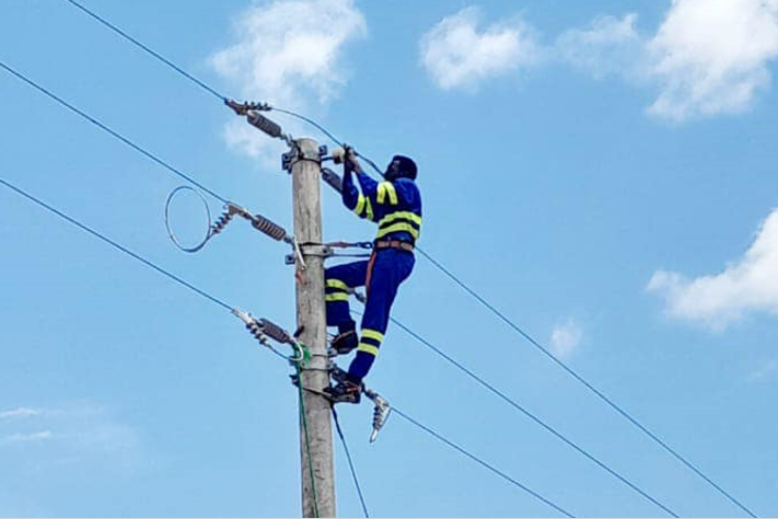 A Kenya Power technician at work
