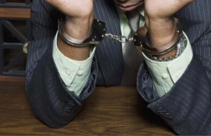 A man in handcuffs. Image used for illustration. PHOTO/Pexel