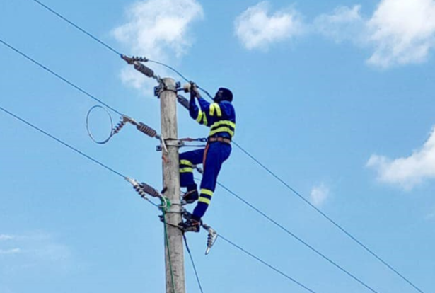 A Kenya Power technician at work. PHOTO/Kenya Power/Facebook