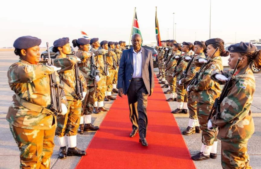 Deputy President Rigathi Gachagua inspects a guard of honour at a South African airport before departing for Kenya. PHOTO/@rigathi/X