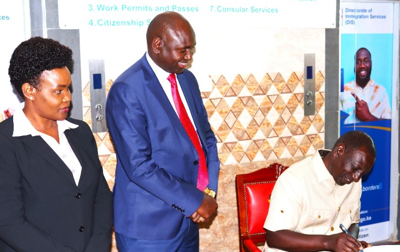 President William Ruto signing a visitor's book at the official launch of the Kericho passport office on March 15, 2024. PHOTO/@ImmigrationDept/X