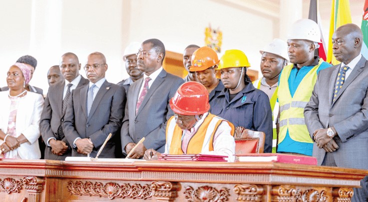 resident Ruto signs the Affordable Housing Bill into law on March 19, at State House, Nairobi. PHOTO/PCS