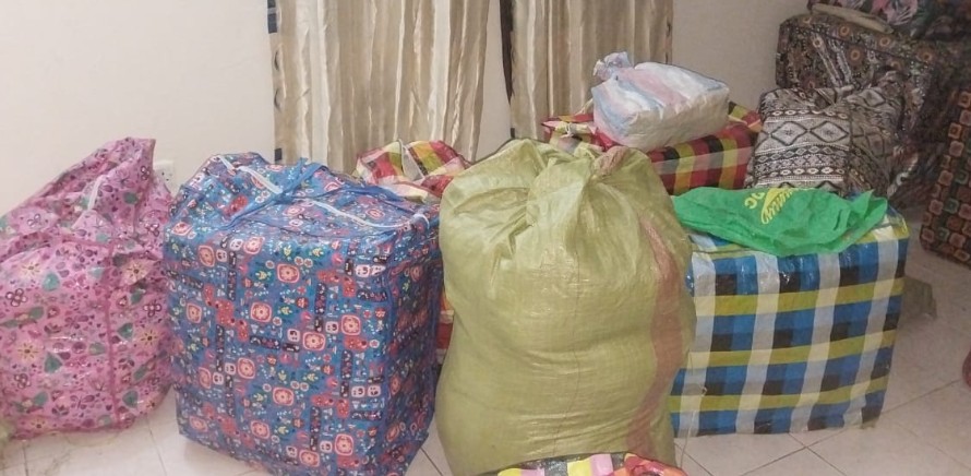 DCI officers display bags of bhang recovered during a raid at at a house in Bamburi, Mombasa. PHOTO/@DCI_Kenya/X