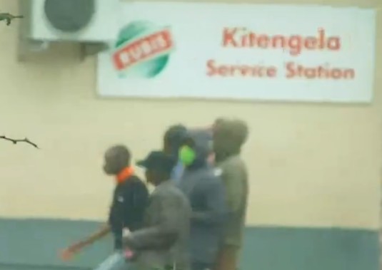 A group of youth head towards a petrol station in Kitengela during the protests. PHOTO/A screengrab by K24 Digital