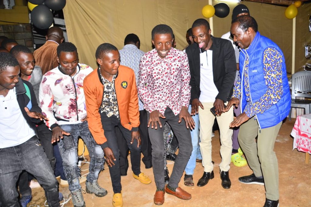 Kalonzo Musyoka engaging in a dance together with the attendees of his teacher's birthday on Saturday, August 17, 2024. PHOTO/@skmusyoka/X