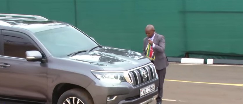 A motor vehicle being fixed with a Kenyan flag after the swearing-in of Eric Muuga as Water Cabinet Secretary at State House, Nairobi on Thursday August 8, 2024. PHOTO/ Screengrab by K24