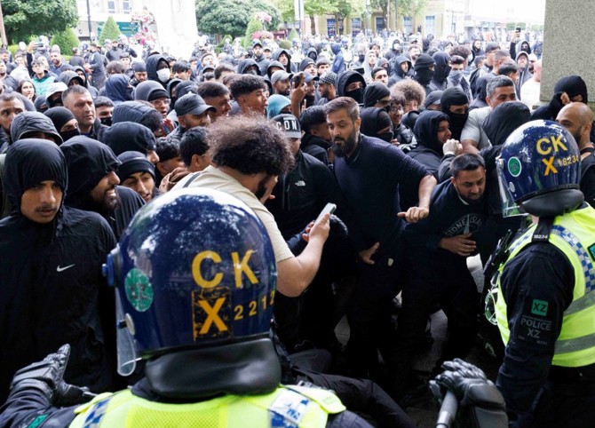 Police clash with protestors in the UK