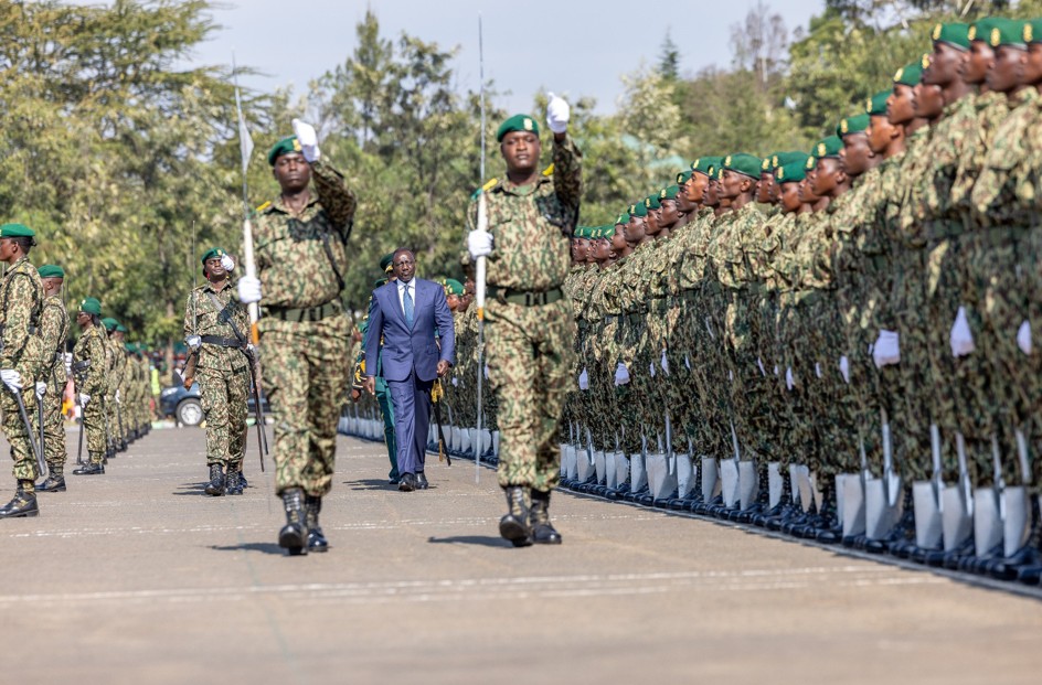 President William Ruto inspects an NYS guard of honour during a pass out parade in Gilgil