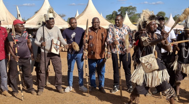 Mps Mpuru Aburi, Patrick Munene, Gitonga Murugara and Kareke Mbiuki join traditional dancers at Ura Gate Cultural Festival PHOTO/Blaise Gitonga