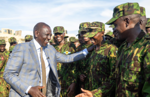 President William Ruto engages Kenyan policemen in Haiti.