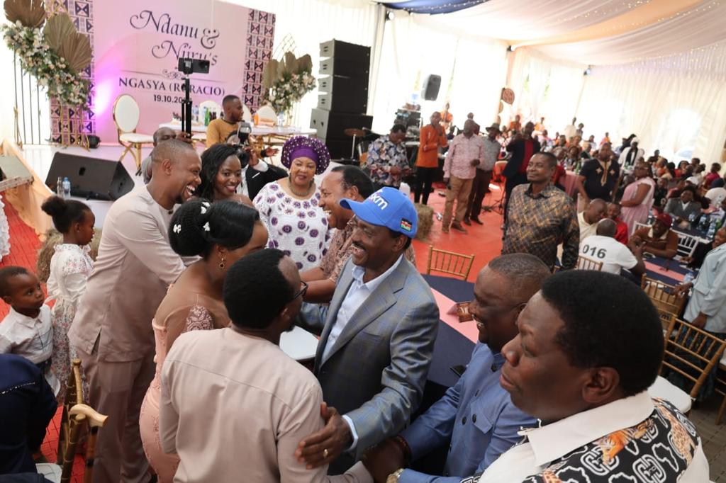 Kalonzo Musyoka having a conversation with lawyer Ndegwa Njiru and his wife Laureen Ndanu, PHOTO/@skmusyoka/X