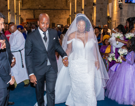 Michael Orengo and Samantha Luseno walking down the aisle during their wedding on Saturday October 26, 2024. PHOTO/@EliudOwalo/X