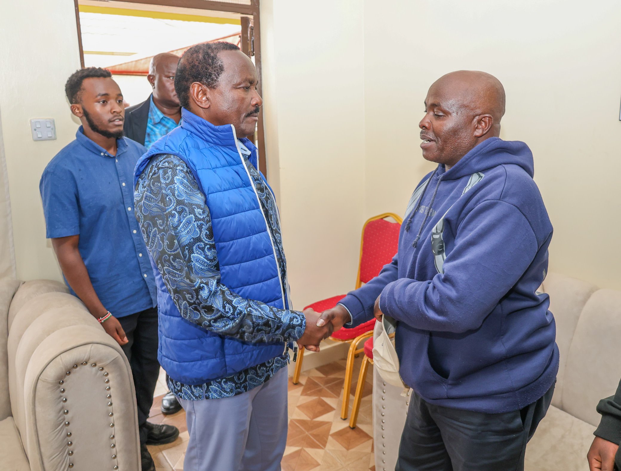 Wiper leader Kalonzo Musyoka shaking hands with late content creator Tabitha Gatwiri's father Robert Kirimi on Thursday, November 7, 2024. PHOTO/@skmusyoka/X