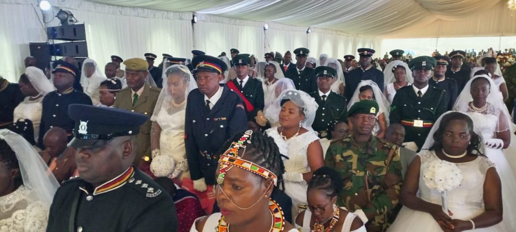 The mass wedding of 84 police officers attended by Pastor Dorcas Rigathi, spouse of former DP Gachagua. PHOTO/K24 TV
