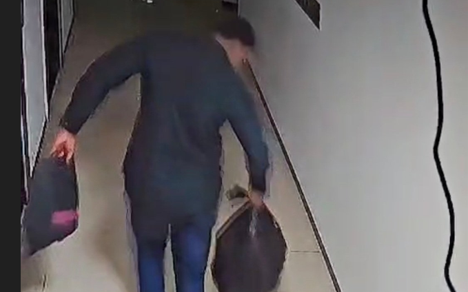 CCTV snippet of a person carrying bags believed to be carrying the remains of a woman reported missing. PHOTO/@DCI_Kenya/X