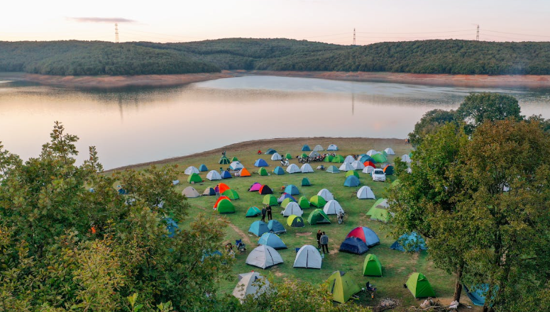 An aerial of a campsite with tents in different colours. PHOTO/Pexels