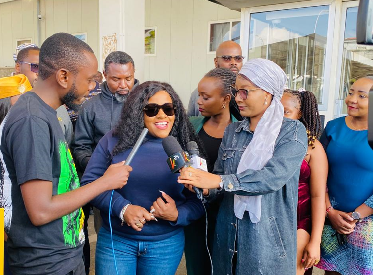 Jamaican reggae sensation Etana and K24 TV's Sarah Ibrahim at the JKIA on Wednesday, December 4, 2024. PHOTO/K24 Digital
