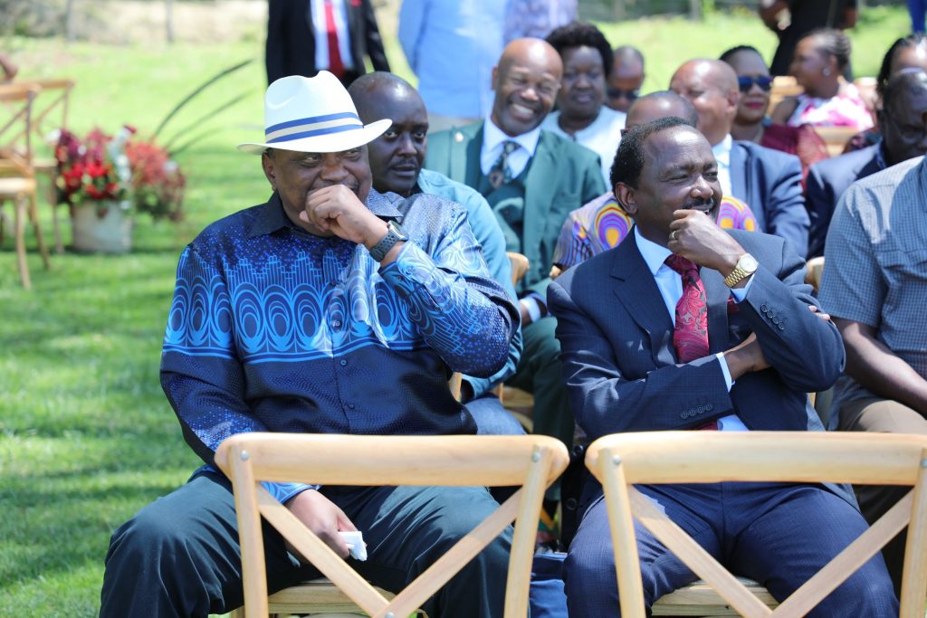 Former President Uhuru Kenyatta and Kalonzo watch during a wedding ceremony on Saturday December 7, 2024. PHOTO/@skmusyoka/X