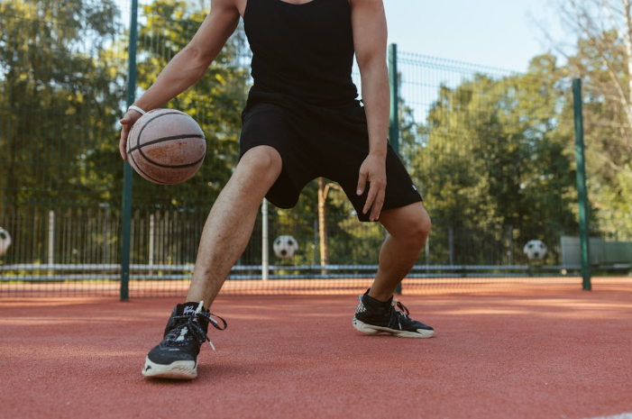 a young person dribbles a basketball. Image used for representation. PHOTO/Pexels