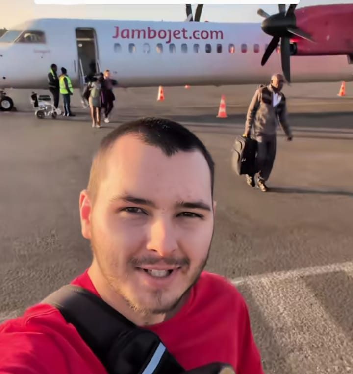 Baba Jimmy poses for a photo at a Kenyan airport. PHOTO/Baba Jimmy/Tiktok.