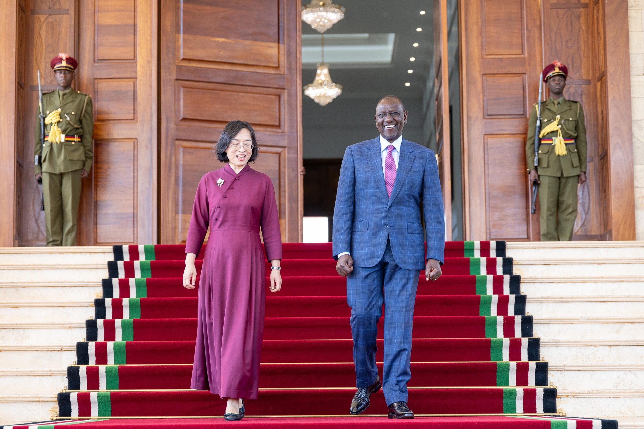 President William Ruto poses for a photo with Chinese Ambassador to Kenya Guo Haiyan.