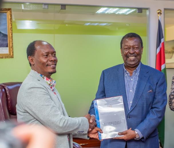 Prime Cabinet Secretary Musalia Mudavadi handing over the reigns of the Ministry of ICT to CS William Kabogo. PHOTO/@honkabogo/X