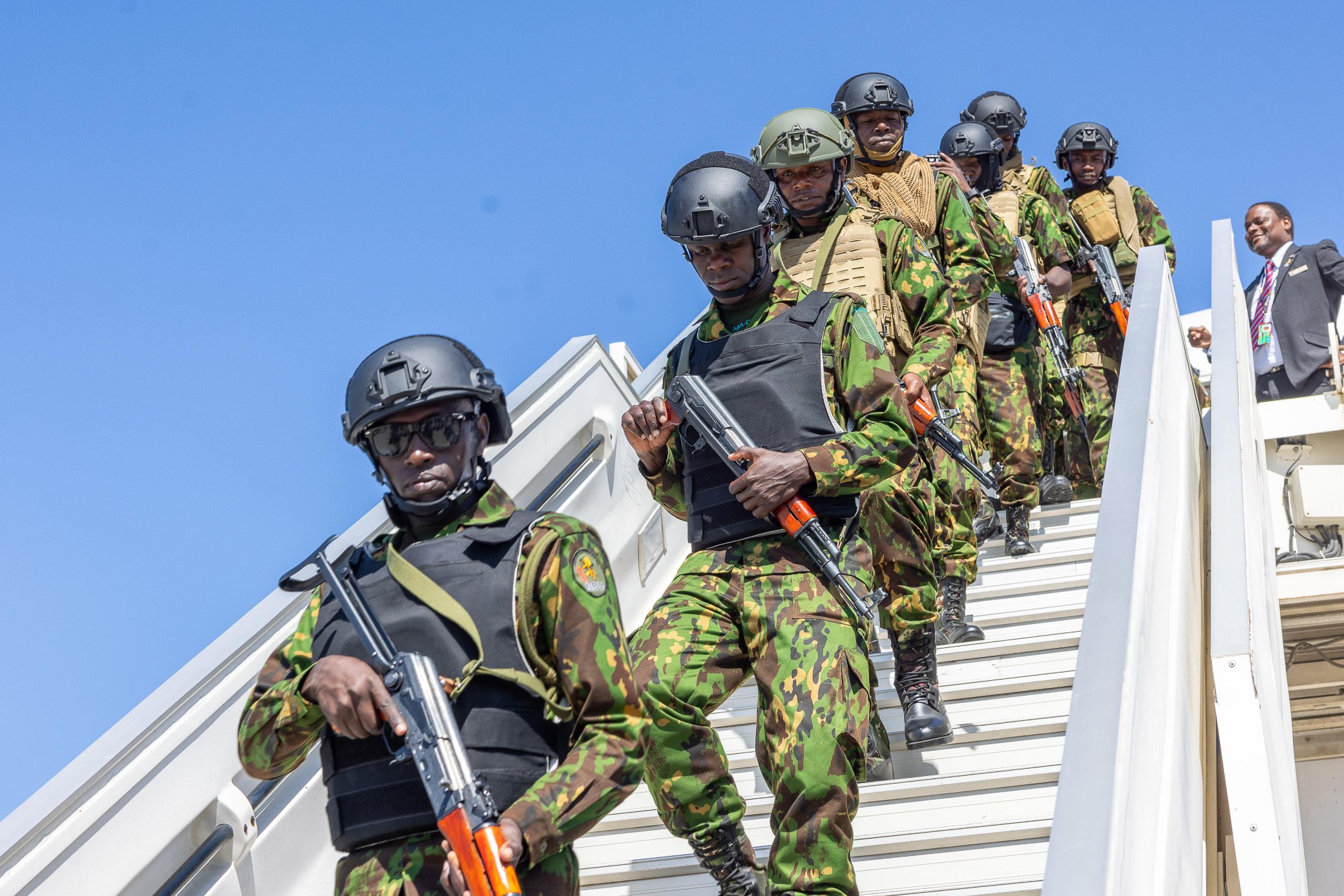 Kenyan police officers alighting from a plane in Haiti on Sunday January 19, 2025. PHOTO/@NPSOfficial_KE/X