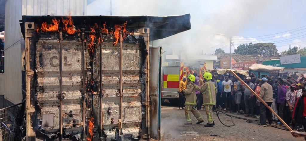 Firefighters containing a flame from a stall at Narok Bus Station on Wednesday January 8, 2025. PHOTO/@OleNtutuK/X