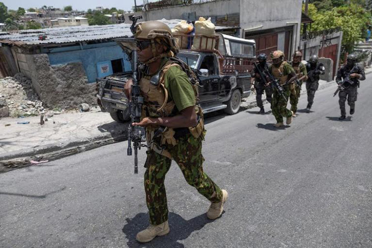 Kenya police officers patrol the streets of Haiti's capital Port-au-Prince on June 28, 2024. PHOTO/@NPSOfficial_KE/X