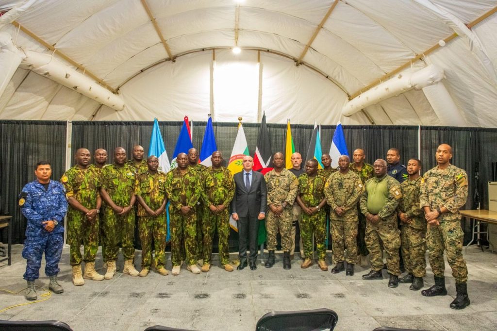 MSSM Force Commander Godfrey Otunge during a meeting with Spanish Ambassador to Haiti, Marco Antonio Penín Toledano andf other leaders. PHOTO/@MSSMHaiti/X