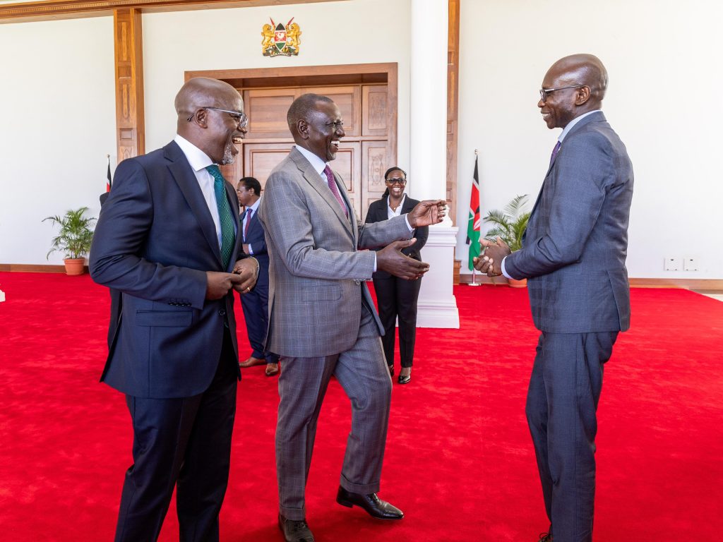 President William Ruto receives the report of the tribunal investigating Justice Mohammed Noor Kullow from Justice Patrick Kiage, the chairperson of the tribunal and judge of the Court of Appeal on Monday February 3, 2025. PHOTO/PCS