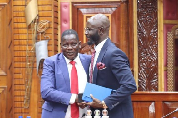 Samuel Atandi and Endebess MP Robert Pukose in Parliament. PHOTO/https://www.facebook.com/ParliamentKE