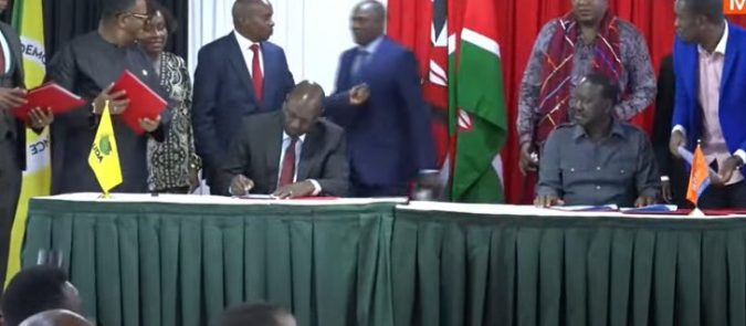 President William Ruto and Former Prime Minster Raila Odinga sigining the agreement. PHOTO/Screengrab by K24 Digital