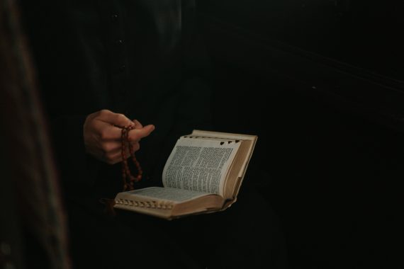 Photo showing a man holding a bible, used for representational purposes only. PHOTO/Pexels