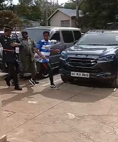 Salasya being escorted by security to his car for safety. PHOTO/Screengrab by K24 Digital from video posted on X by @TeyaKevin