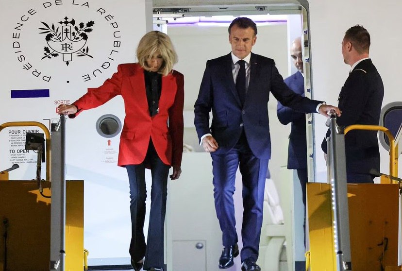 French president, Emmanuel Macron and wife Brigitte Macron getting off the plane PHOTO/@fr_presstv/x
