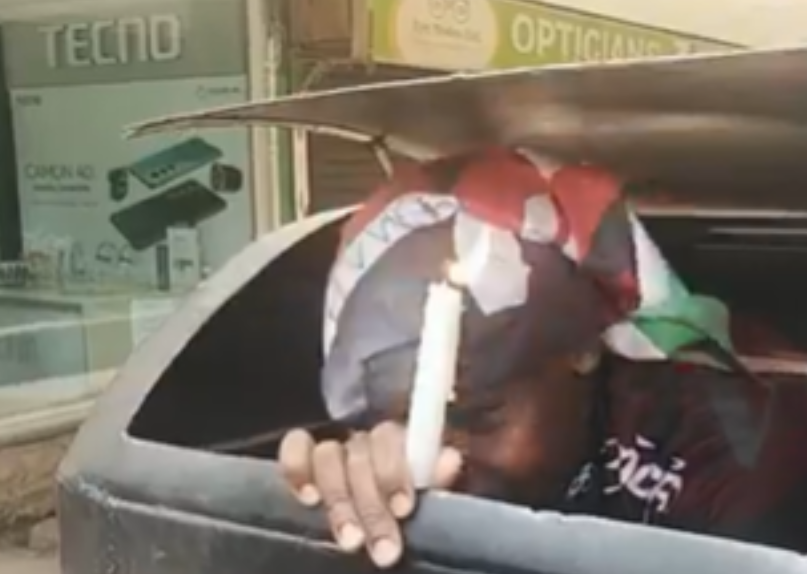 Protester hides inside newly installed CBD dustbin