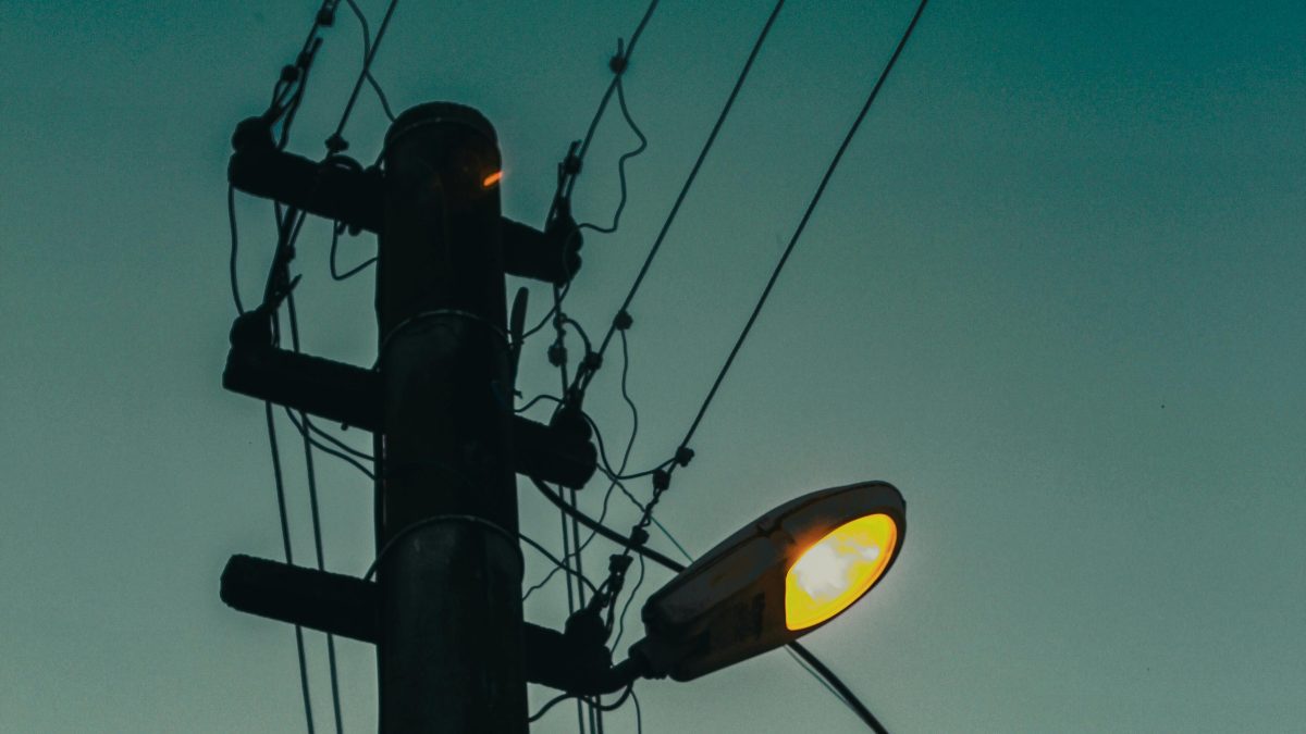 An electricity pole with a lighting bulb during a blackout. PHOTO/Pexels