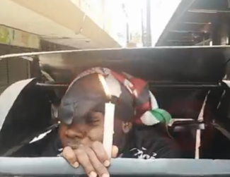 A protester hiding in a dustbin on Wednesday, June 25, 2025, during Gen Z memorial protests. PHOTO/Screengrab by K24 Digital