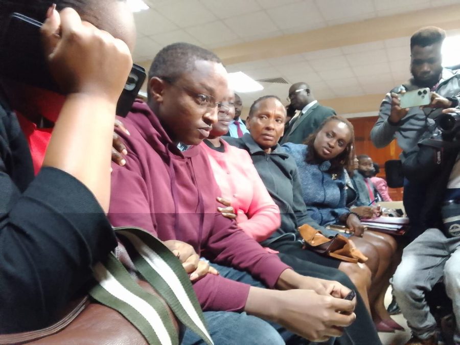 Social media activist Ndiangui Kinyagia with his family at the Milimani High Court on Thursday, July 3, 2025. PHOTO/Zipporah Ngwatu